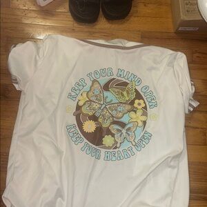 White Graphic Tee with Butterfly Design